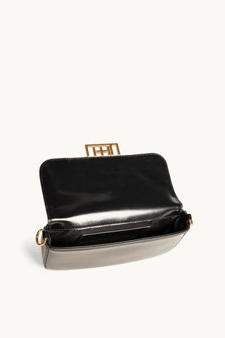 The Jolie Leather Baguette Mini Bag in Black/Gold Internals