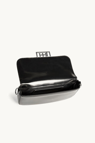 The Jolie Leather Baguette Mini Bag in Black/ Silver Internals