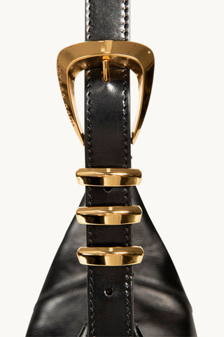 The Neveah Leather Sling Bag in Black/Gold Details