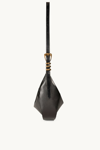 The Neveah Leather Sling Bag in Black/Gold Side